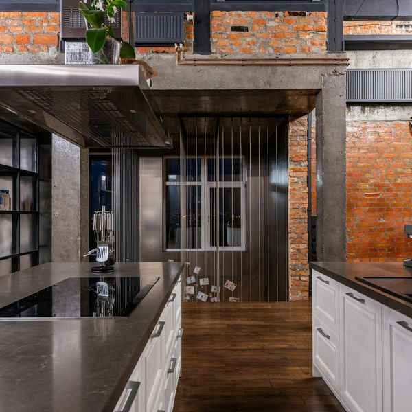 Industrial loft interior with exposed brick and concrete