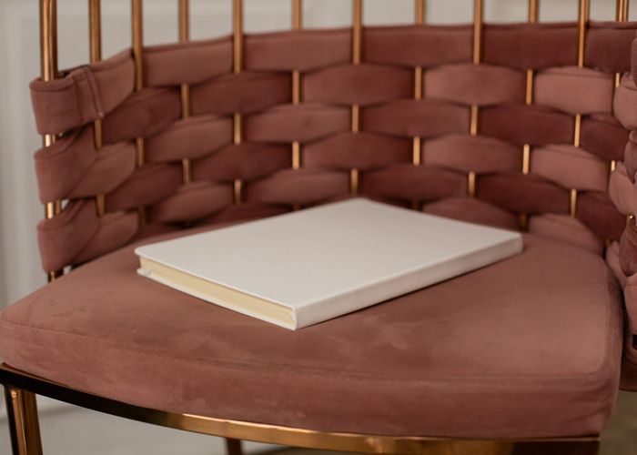 Luxurious minimalist living room with natural light and designer furniture