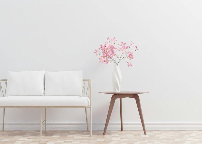 Scandinavian style apartment with white walls and wooden accents