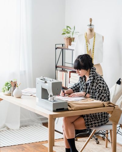 Woman interior designer in modern studio